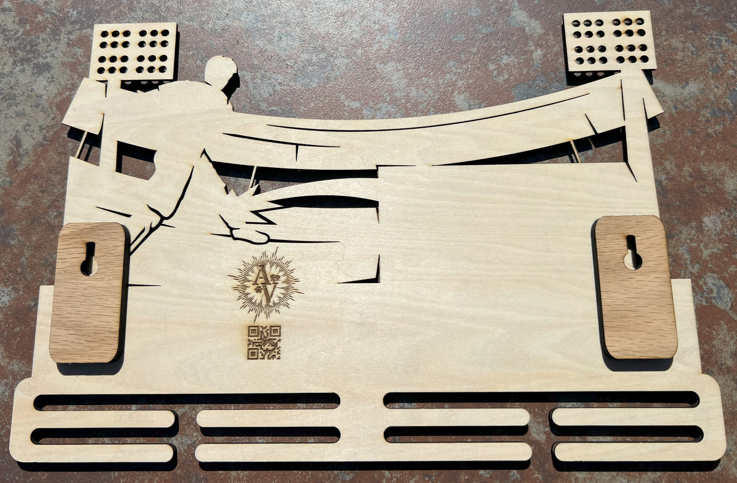 Back of soccer medal display with wall mount.